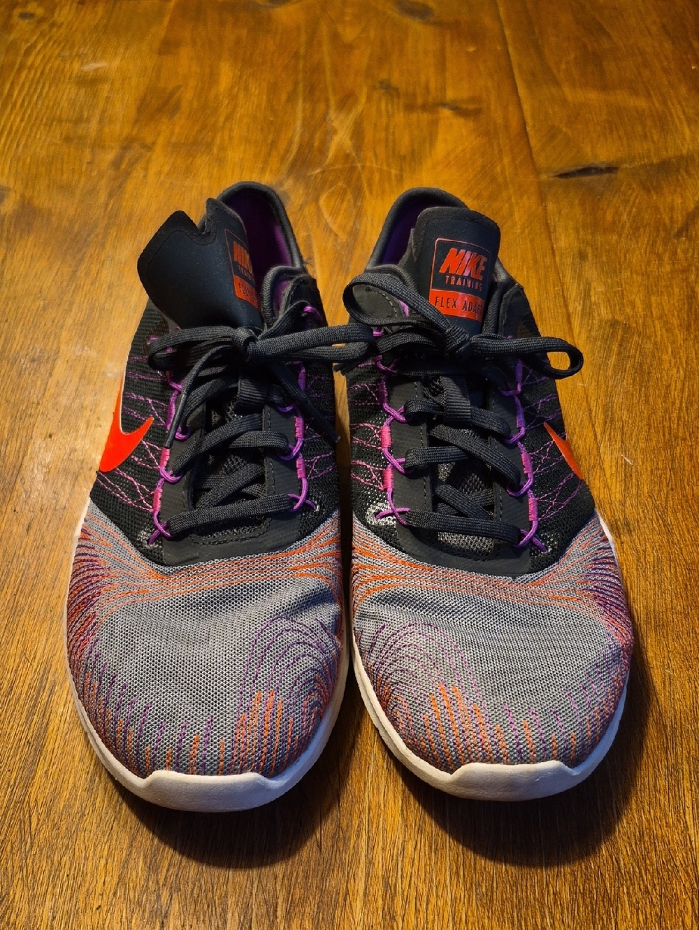 Nike Women’s Black Knit Running Shoes with Purple and Orange Accents